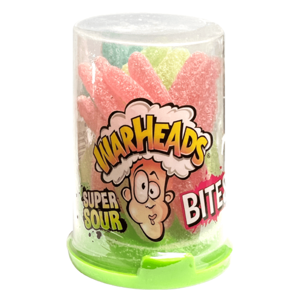 Un emballage vert sur fond blanc, un capuchon transparent avec un visage qui a la tête qui explose et à l’intérieur il y a de longs bonbons rouges, jaunes et verts