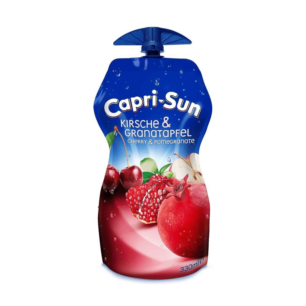 Une bouteille de forme spéciale bleu au-dessus et rouge en-dessous avec des cerises, des pommes et des grenades. Le tout sur fond blanc
