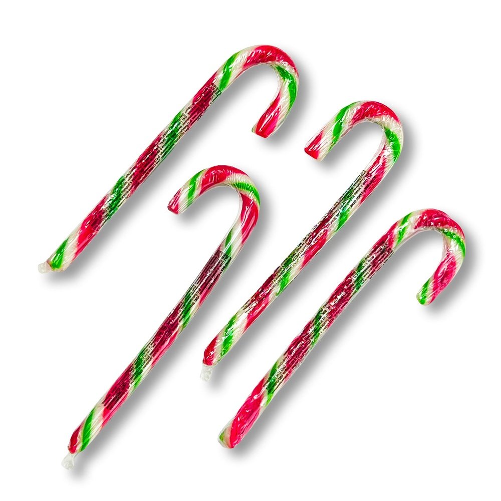4 cannes à sucre de Noël de couleurs vert, rouge et blanc sur fond blanc