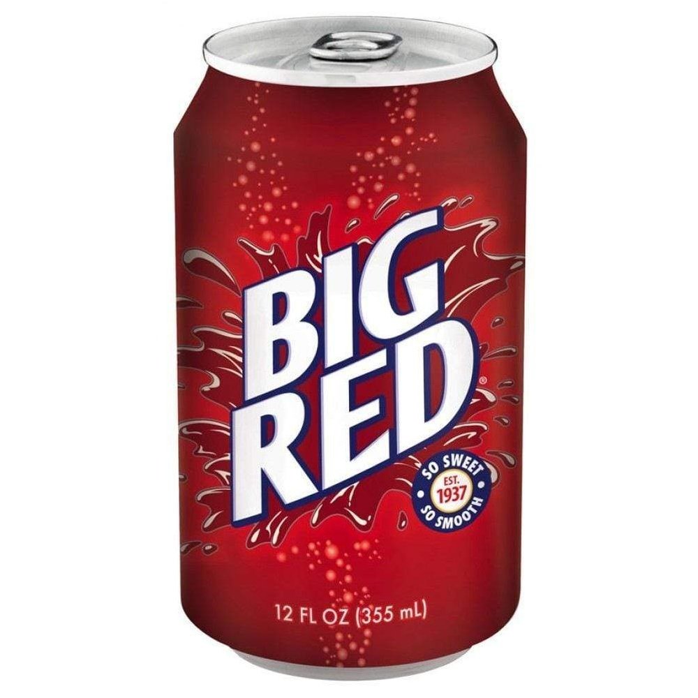  Une canette rouge sur fond blanc avec des bulles et un liquide autour du logo « Big Red »