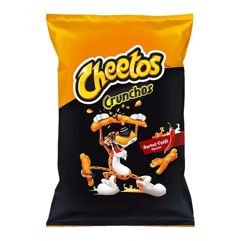 Un paquet orange et noir avec un tigre qui coupe en 2 un chips orange allongé et sur le coté droit un piment rouge, le tout sur fond blanc