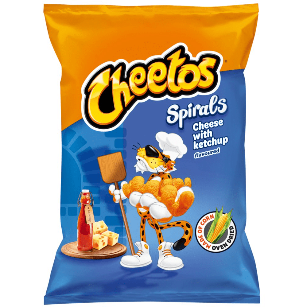 Un paquet orange et bleu avec un tigre avec une spatule en bois et une toque blanche. Plus bas un fromage et du ketchup sur une planche en bois, le tout sur fond blanc
