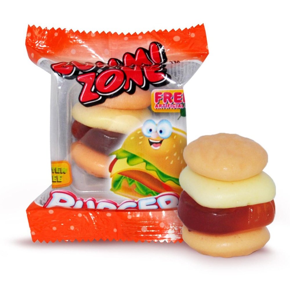 A gauche, un emballage transparent aux extrémités rouge avec un hamburger et à droite un bonbon en forme d’hamburger. Le tout sur fond blanc