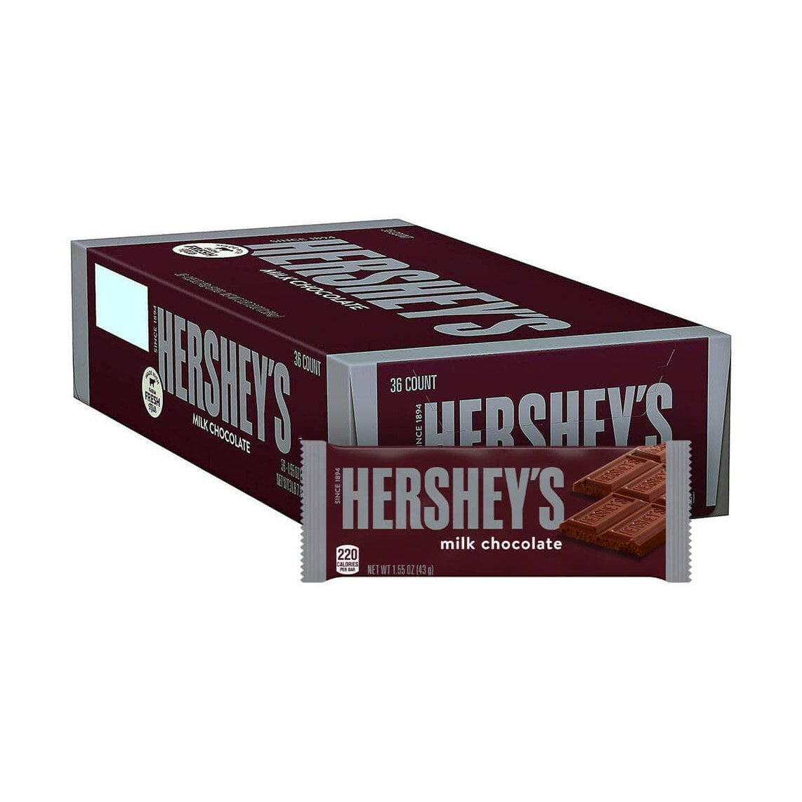 Un carton marron et un emballage marron aux extrémités grises avec à droite une tablette de chocolat, le tout sur un fond blanc