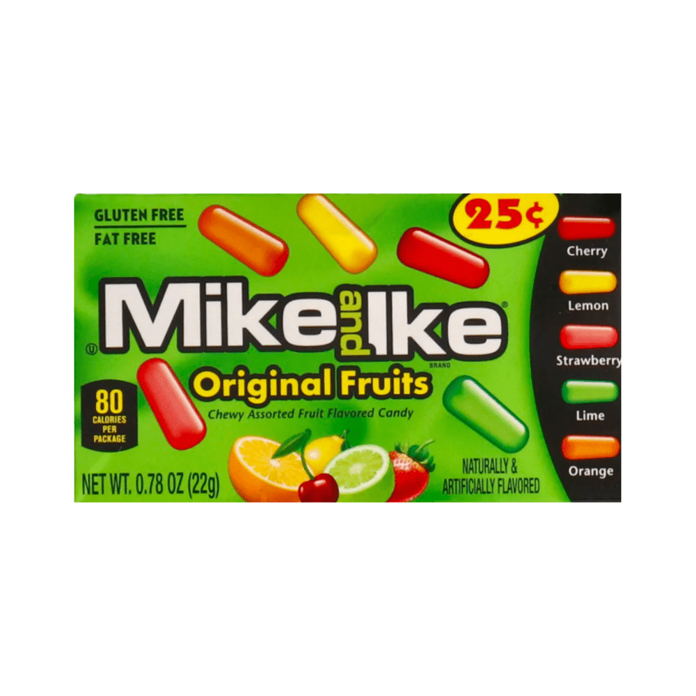 Un emballage vert sur fond blanc avec des bonbons en formes de pilules colorés et à droite il y a 5 bonbons rouge, jaune, rose, vert et orange. En-dessous des orange, citron, fraises et cerises