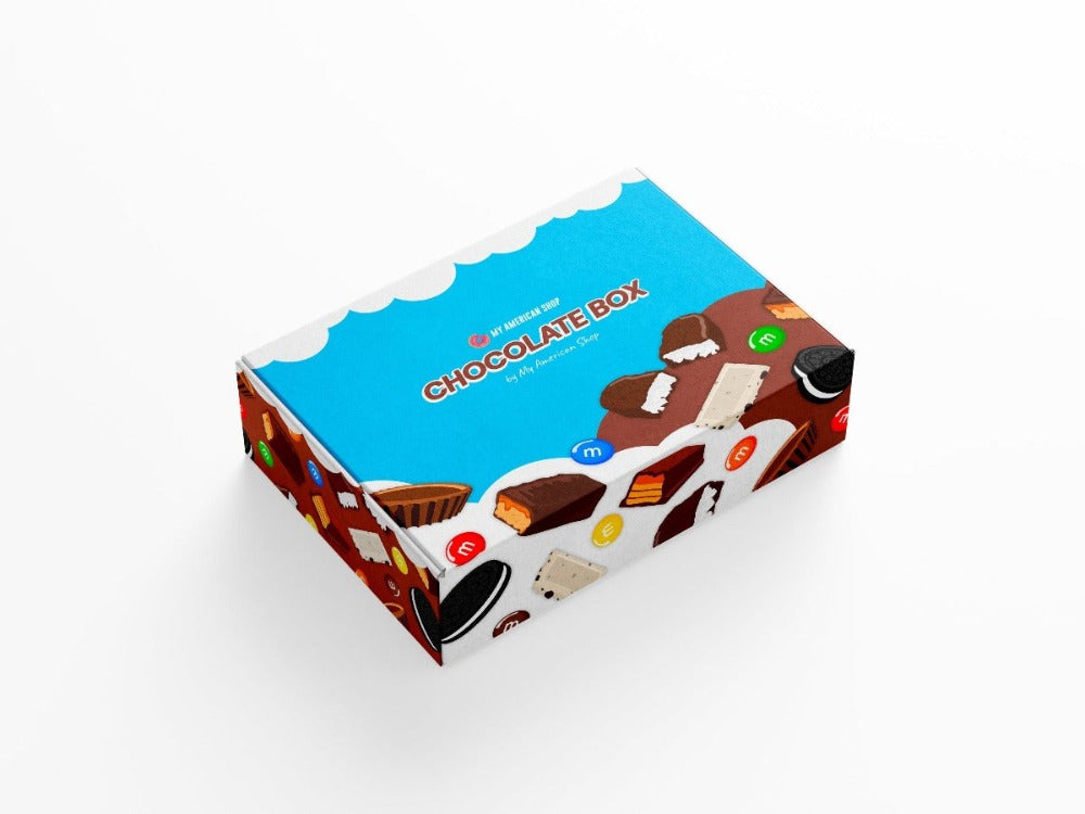 Un carton bleu et brun avec des dessins de chocolats, le tout sur fond blanc