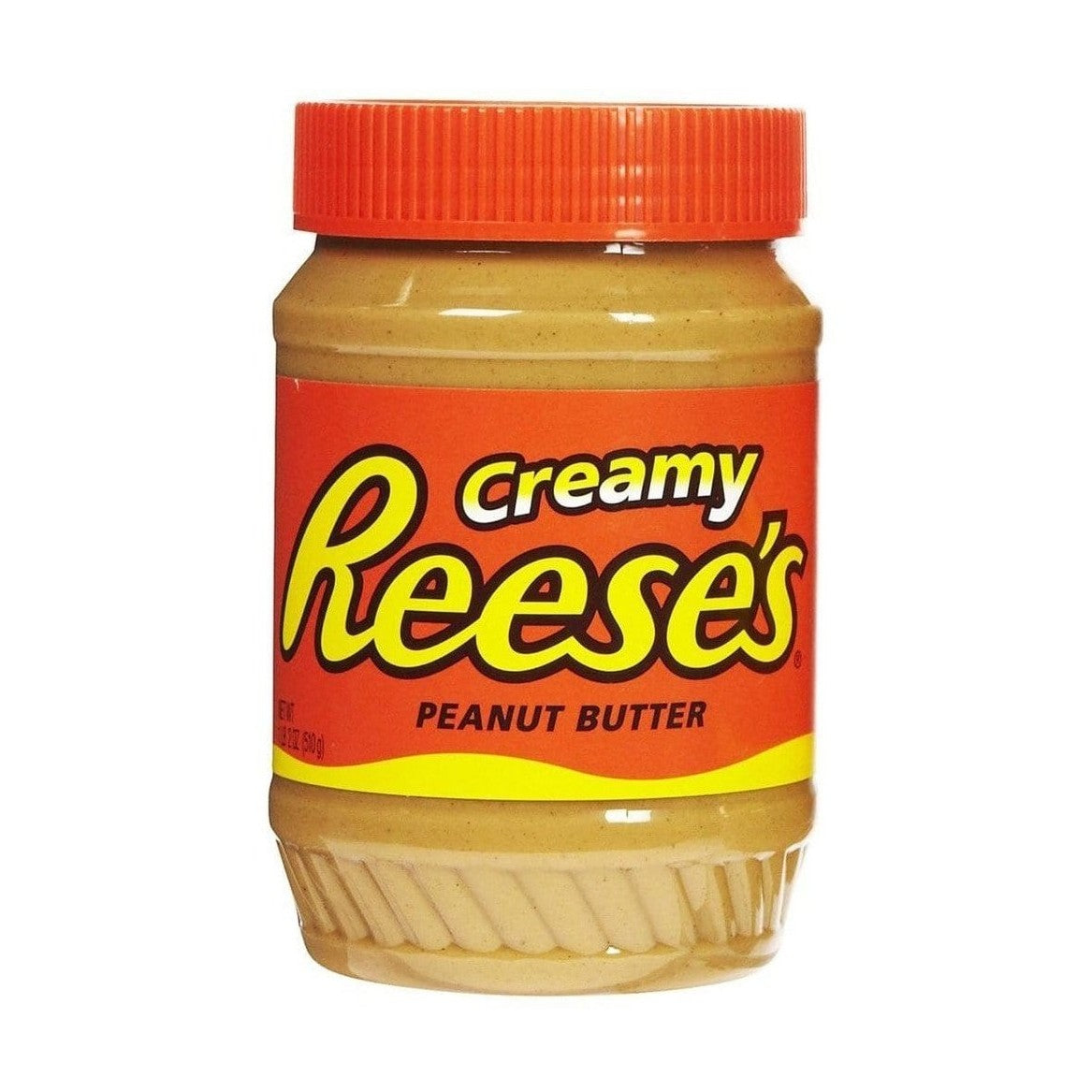 Un pot transparent avec une pâte brune claire, un capuchon orange et une étiquette orange avec écrit « Reese’s » en jaune. Le tout sur fond blanc